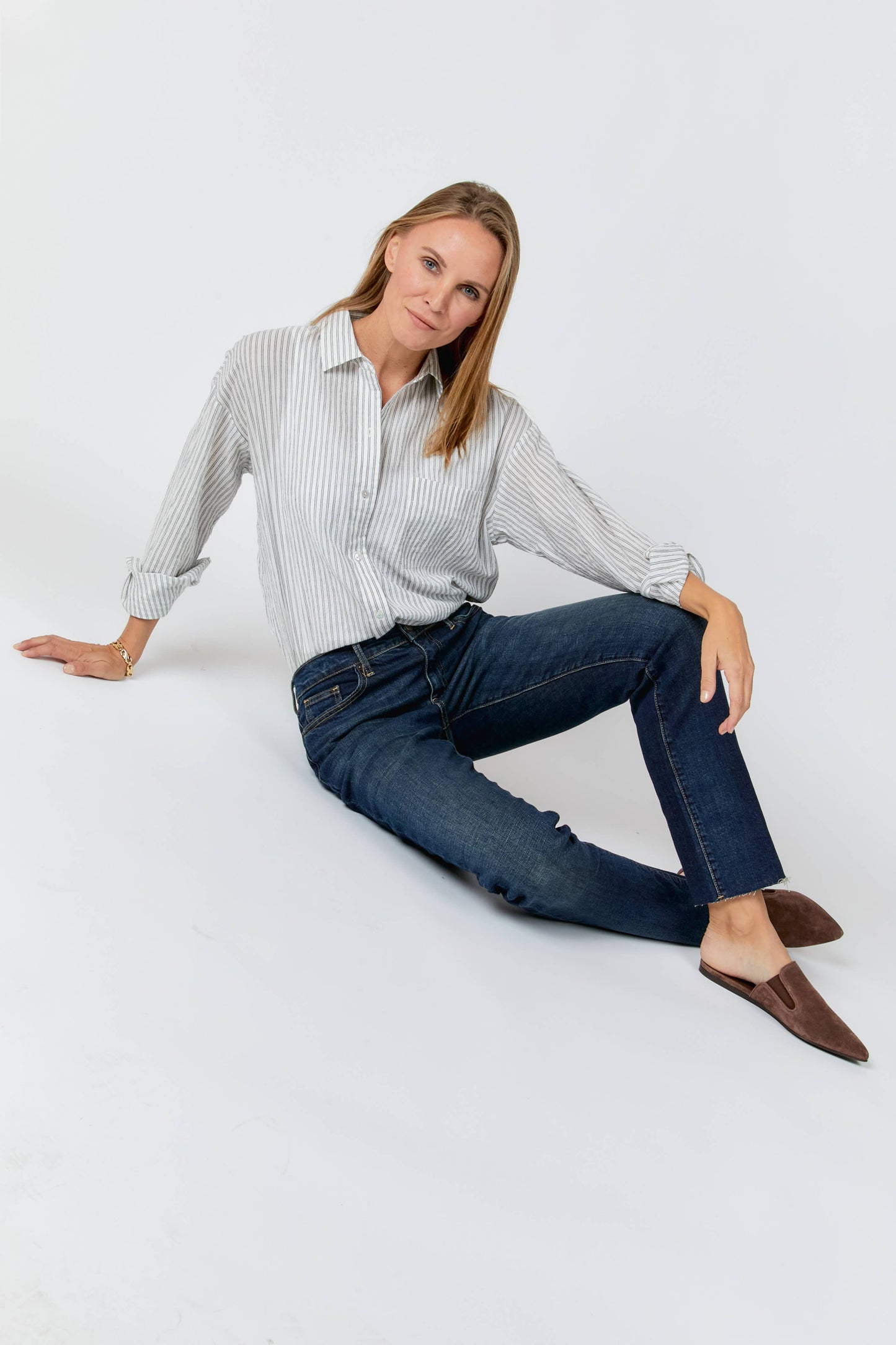 Crosby High Rise Relaxed Taper Denim Jeans by Oliver Logan