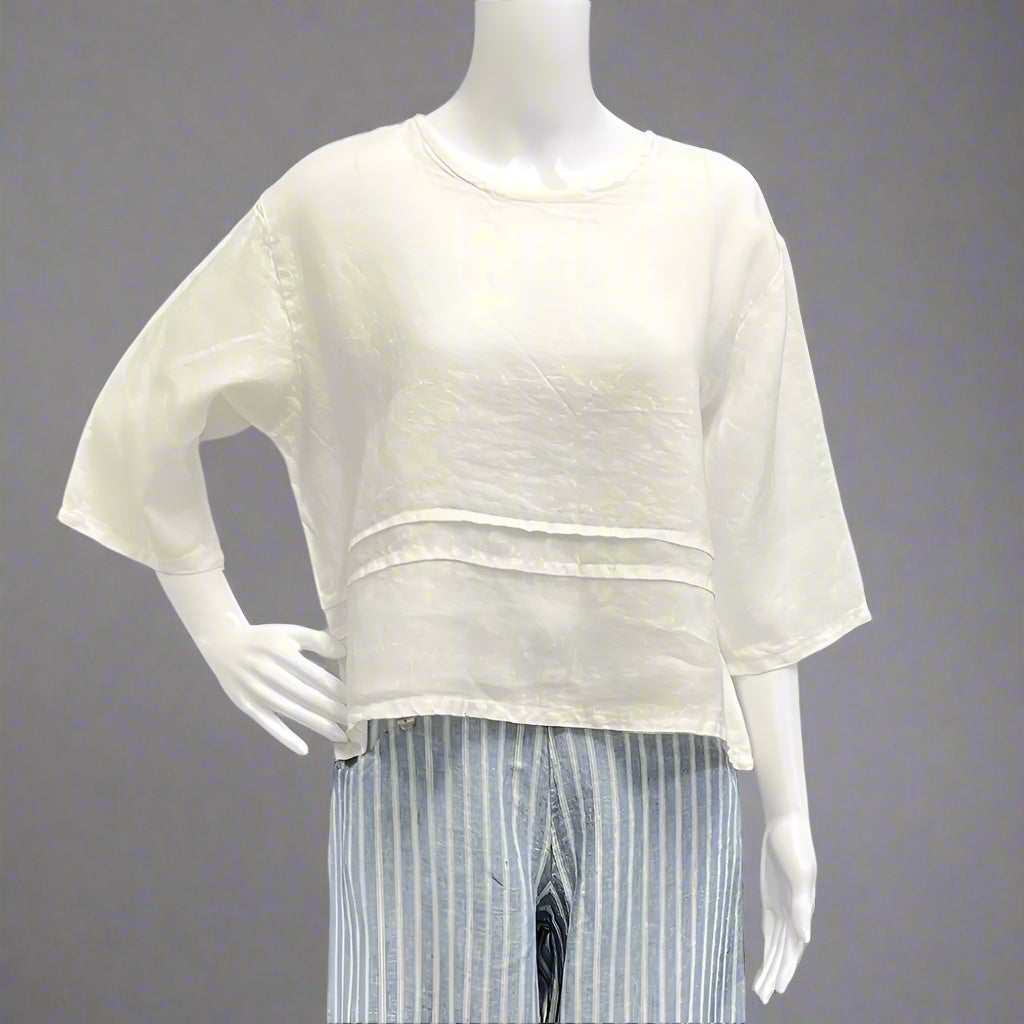Victoria Susan Wearable Art is a ladies clothing store in downtown Camden sc. Bryn Walker in light linen.