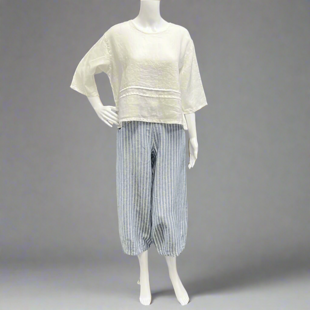 Victoria Susan Wearable Art is a ladies clothing store in downtown Camden sc. Bryn Walker in light linen.