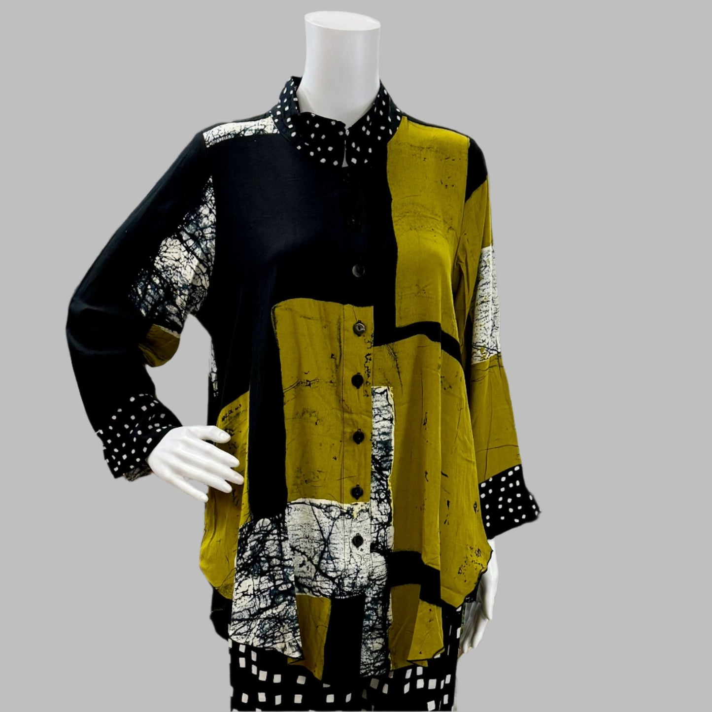 Iguana : Wear your art on your sleeve. Hand Batiked so no two pieces are alike. Iguana is the epitome of Art to Wear and Victoria Susan Wearable Art is thrilled to carry these amazing pieces. Victoria Susan Wearable Art is a womens clothing store in Camden sc.