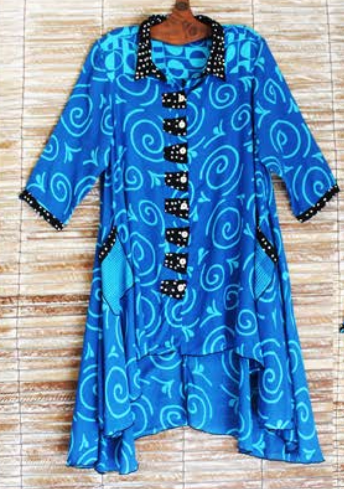 Iguana : Wear your art on your sleeve. Hand Batiked so no two pieces are alike. Iguana is the epitome of Art to Wear and Victoria Susan Wearable Art is thrilled to carry these amazing pieces. Victoria Susan Wearable Art is a womens clothing store in Camden sc.