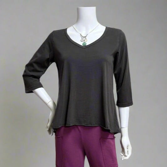 Mannequin wearing a graphite top and razzleberry pants at Victoria Susan in Camden SC.  Shop women's clothing and Prairie Cotton