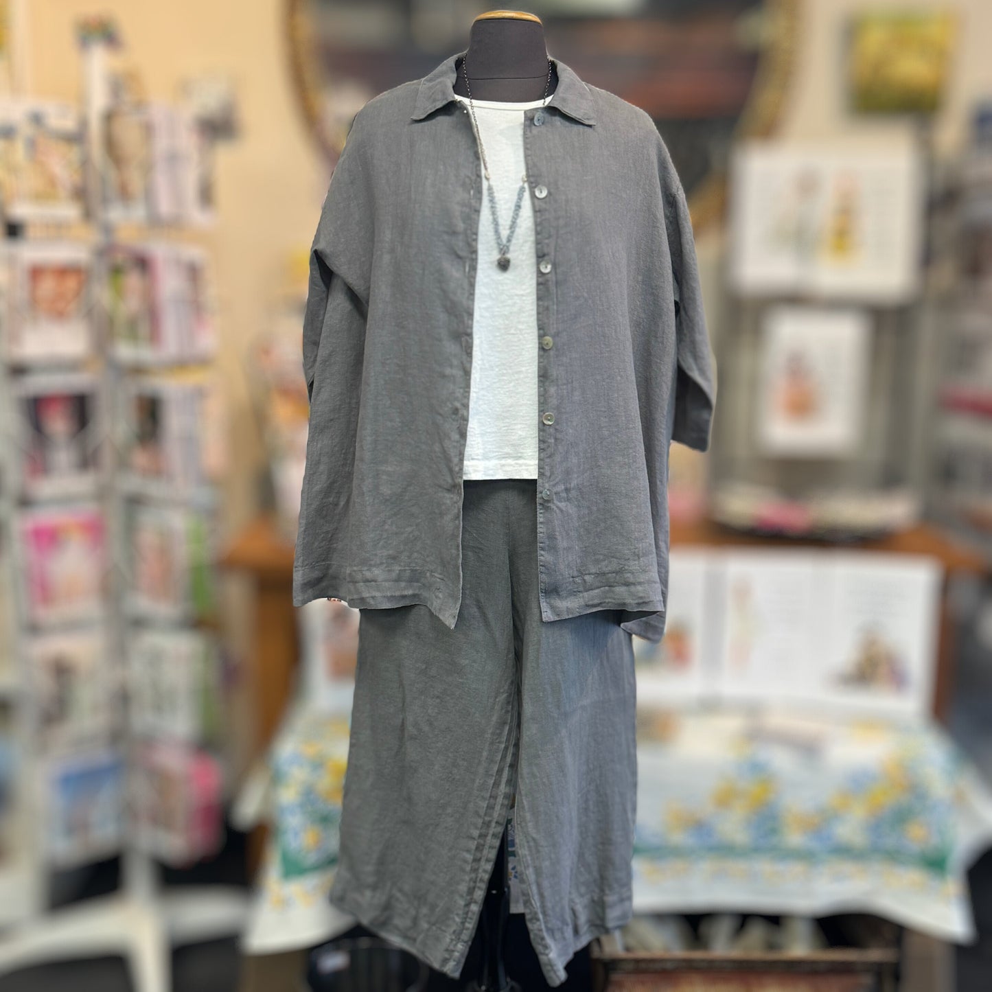 Bryn Walker Gordon in Light Linen Ladies Shirt. Available now at Victoria Susan Wearable Art.Victoria Susan Wearable Art is proud to carry USA Made Bryn Walker.  Bryn Walker designs are for women who demand comfort, quality and easy sophistication. Clothing for Travel. Linen Shirt. Linen Pants. Clothing for Women. Clothing for Ladies. Clothing for Petites. Clothing for Plus. Victoria Susan in Downtown Camden SC. 