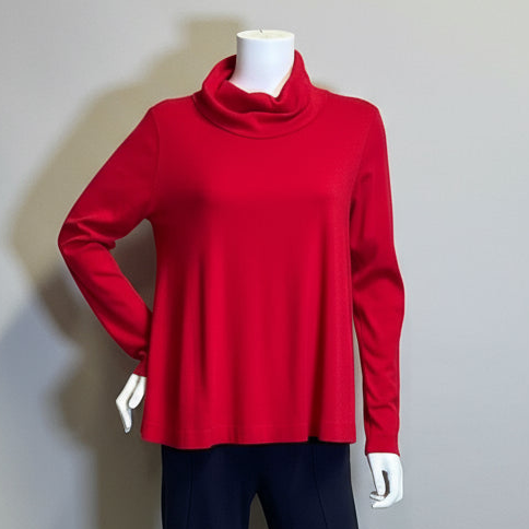 Red swing turtle on a mannequin against a gray background at Victoria Susan in Camden SC