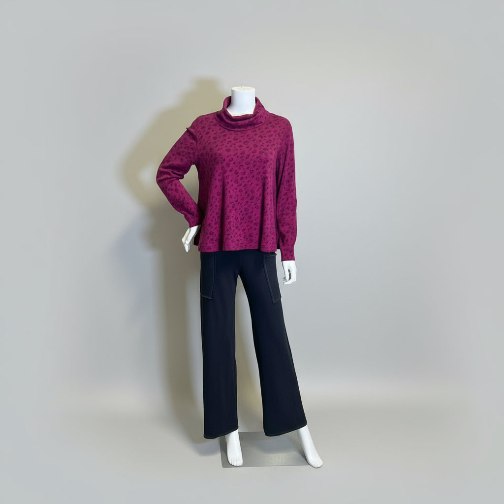 Mannequin wearing a purple sweater and black pants at Rutledge Exchange in Camden SC