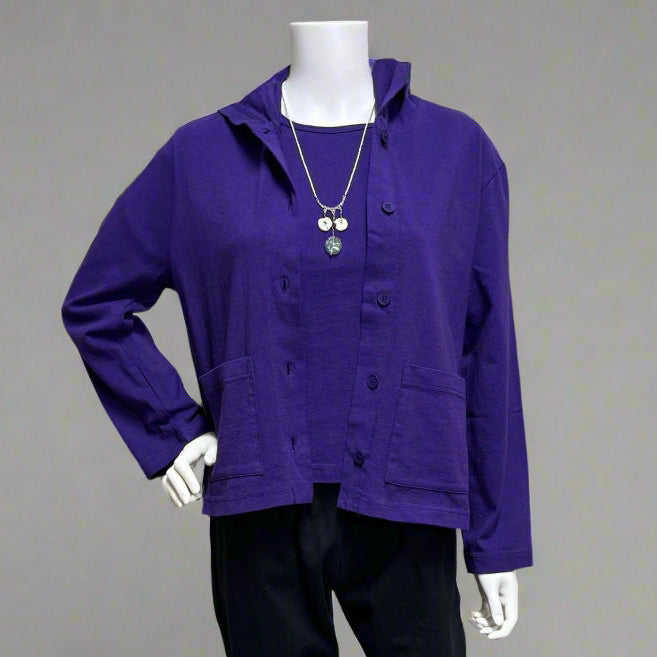 Mannequin wearing a purple jacket and black pants against a beige background. Shop women's clothing and wearable art at Victoria Susan in Camden SC. 