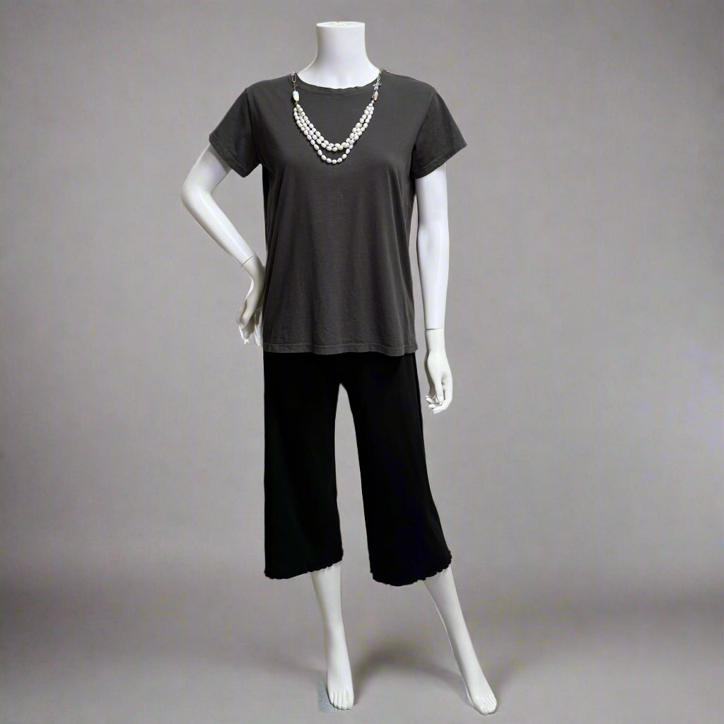 Mannequin wearing a graphite  gray t-shirt  by Prairie Cotton with a necklace at Victoria Susan in Camden SC