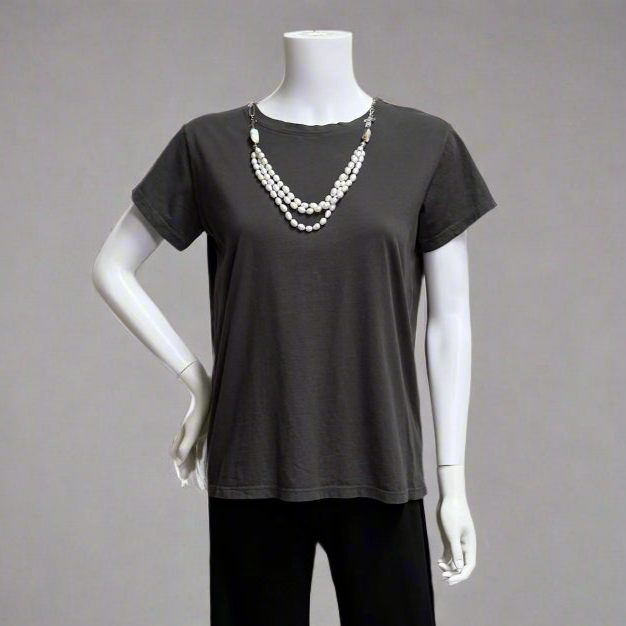 Mannequin wearing a graphite  gray t-shirt  by Prairie Cotton with a necklace at Victoria Susan in Camden SC