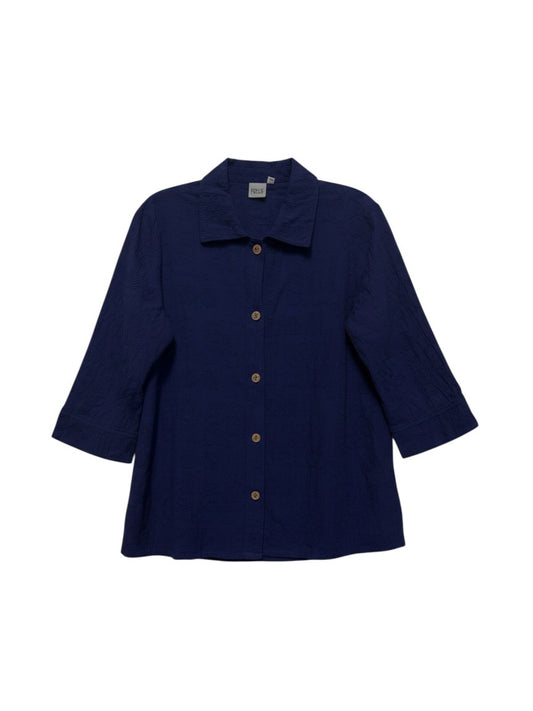A navy blue long-sleeve button-up shirt with a relaxed, slightly flared silhouette, laid flat against a solid white background.