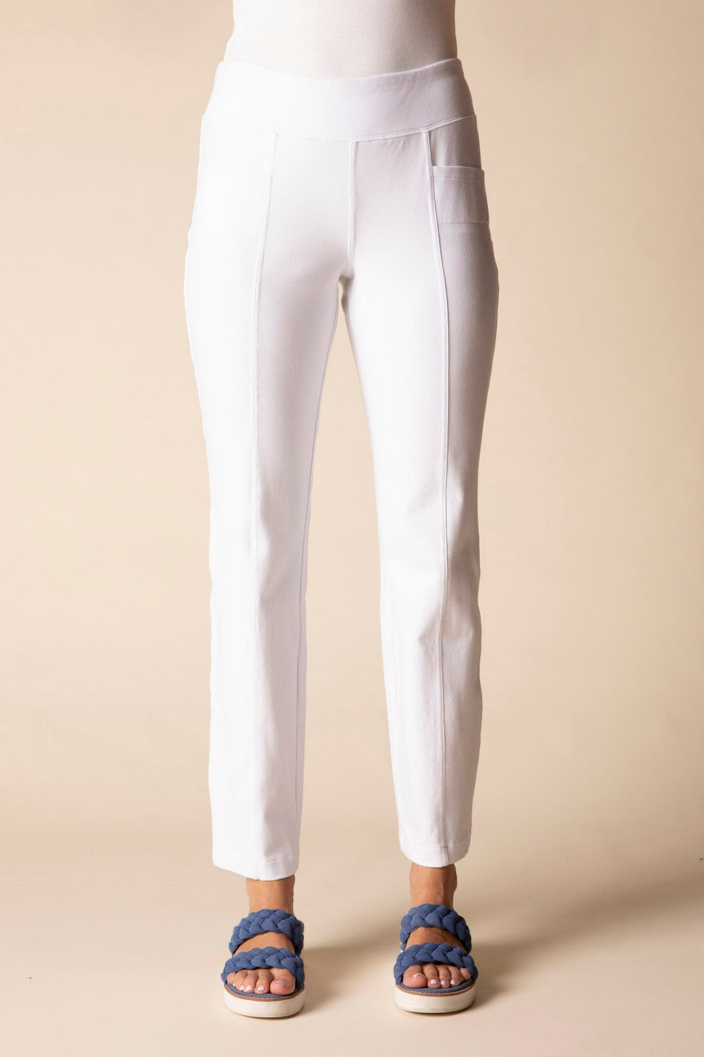White pants on a mannequin against a beige background at Victoria Susan in Camden SC