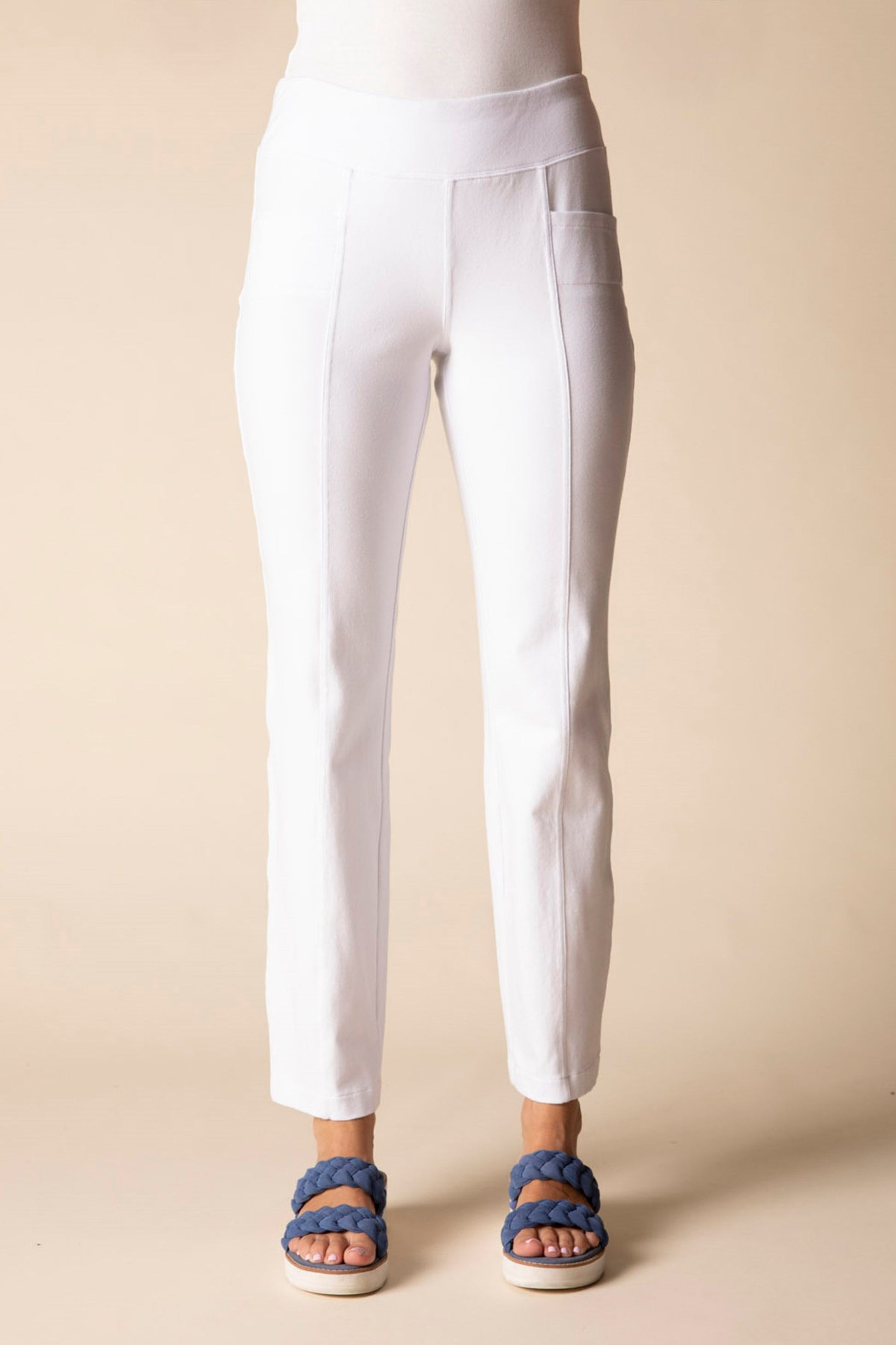 White pants on a mannequin against a beige background at Victoria Susan in Camden SC